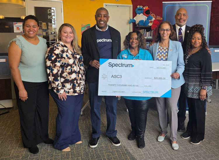 Ashbury group, L-R: Spectrum's Damelvy Rodriguez, Kayla Lewis, and Rahman Khan; Ashbury's Wanda Davis, Cuyahoga County Council  member Yvonne Conwell, Cleveland City Council President Blaine Griffin, Ashbury's  Shaletha Mitchell.
